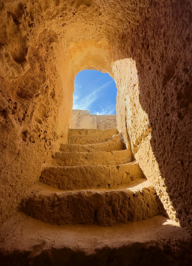 Stairway with stone walls